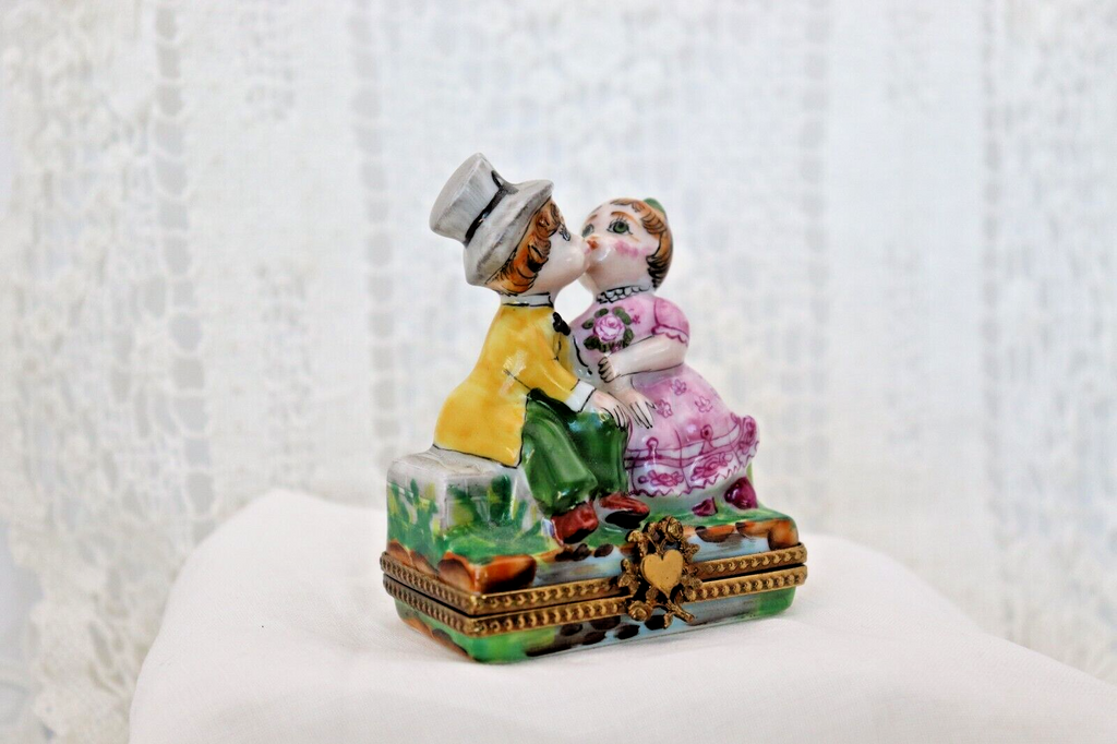 Limoges, France Porcelain Kissing Couple Sitting on a Wall Shaped Trinket Box - LADYBIRD LAUGH
