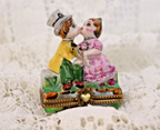 Limoges, France Porcelain Kissing Couple Sitting on a Wall Shaped Trinket Box - LADYBIRD LAUGH
