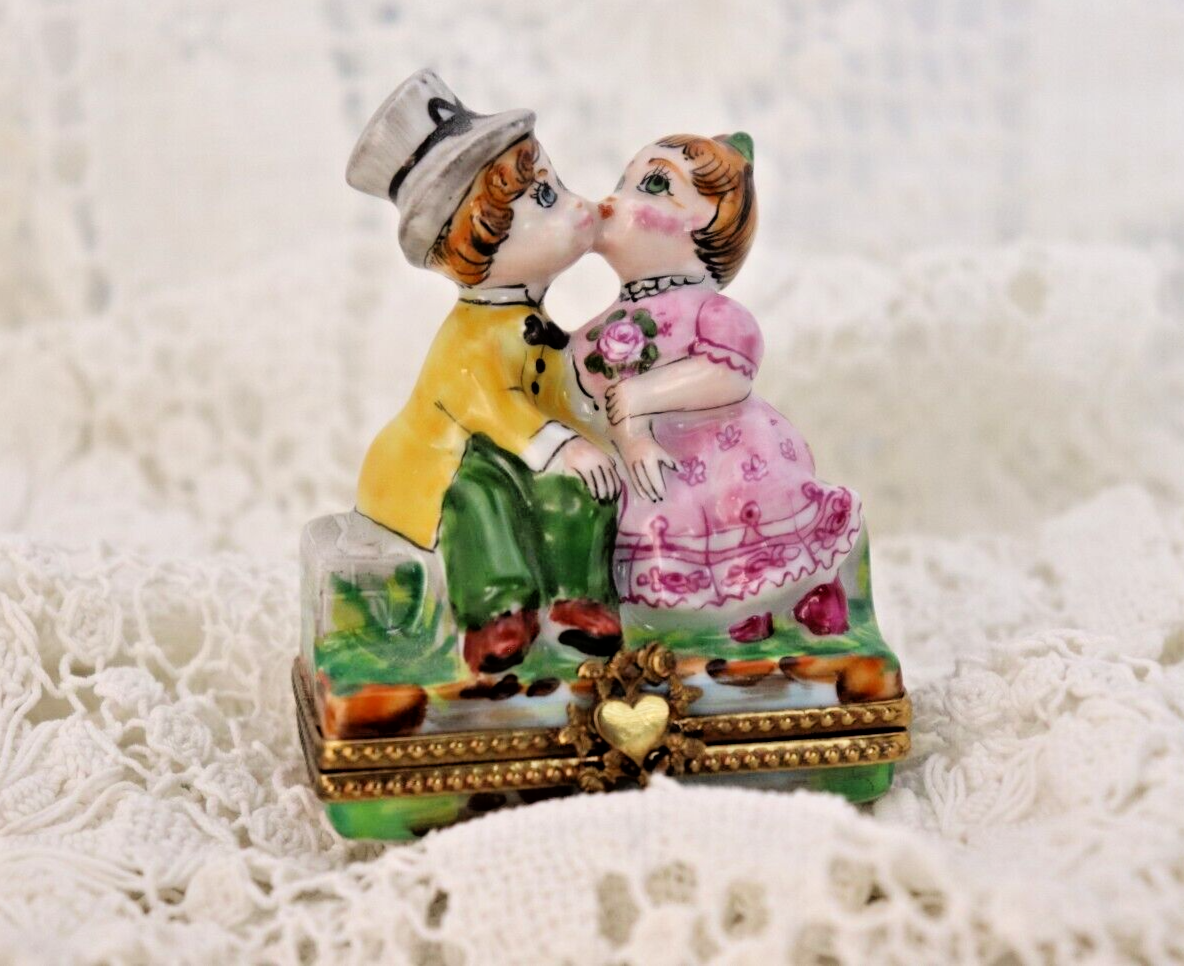 Limoges, France Porcelain Kissing Couple Sitting on a Wall Shaped Trinket Box - LADYBIRD LAUGH