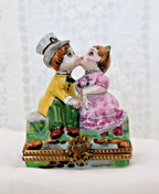 Limoges, France Porcelain Kissing Couple Sitting on a Wall Shaped Trinket Box - LADYBIRD LAUGH