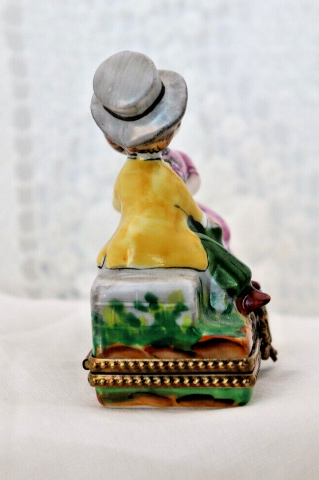 Limoges, France Porcelain Kissing Couple Sitting on a Wall Shaped Trinket Box - LADYBIRD LAUGH