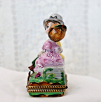 Limoges, France Porcelain Kissing Couple Sitting on a Wall Shaped Trinket Box - LADYBIRD LAUGH