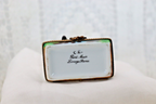 Limoges, France Porcelain Kissing Couple Sitting on a Wall Shaped Trinket Box - LADYBIRD LAUGH
