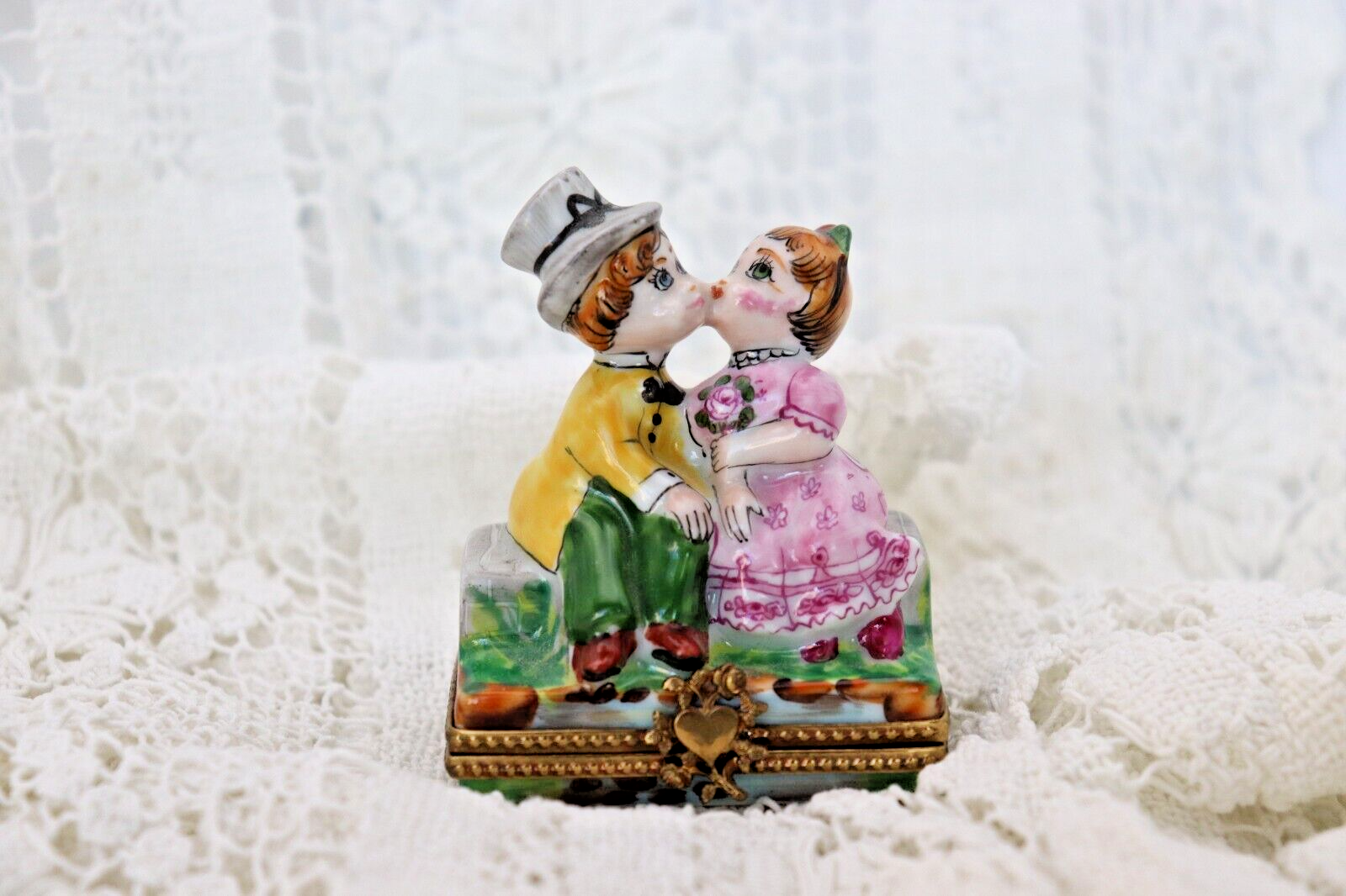 Limoges, France Porcelain Kissing Couple Sitting on a Wall Shaped Trinket Box - LADYBIRD LAUGH