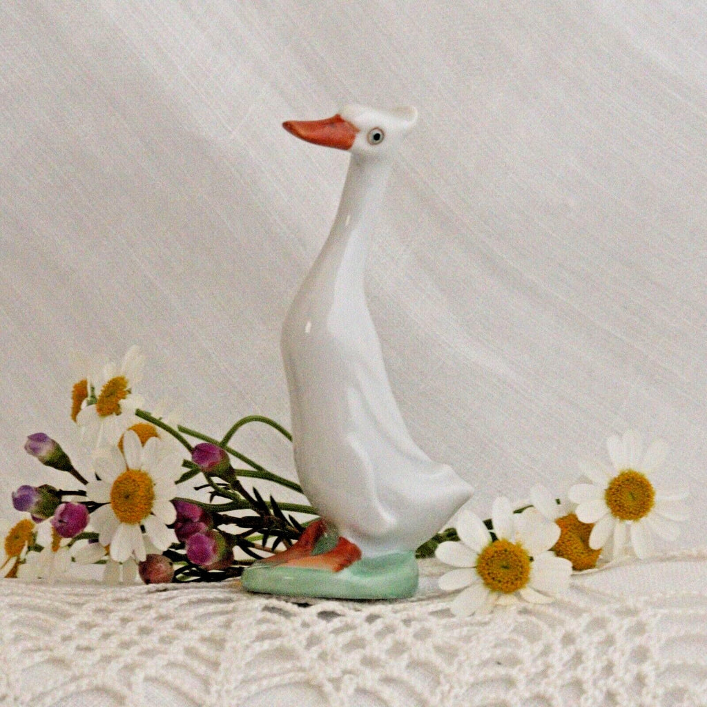 Porcelain Duck Figurine: Cheeky White Runner - Hand-Painted Art Nouveau