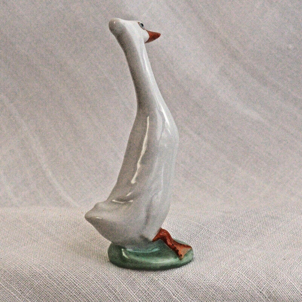 Porcelain Duck Figurine: Cheeky White Runner - Hand-Painted Art Nouveau
