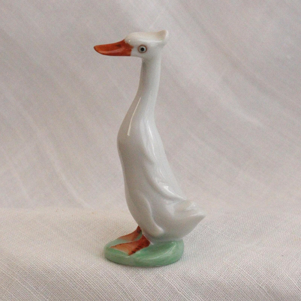 Porcelain Duck Figurine: Cheeky White Runner - Hand-Painted Art Nouveau