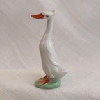 Porcelain Duck Figurine: Cheeky White Runner - Hand-Painted Art Nouveau