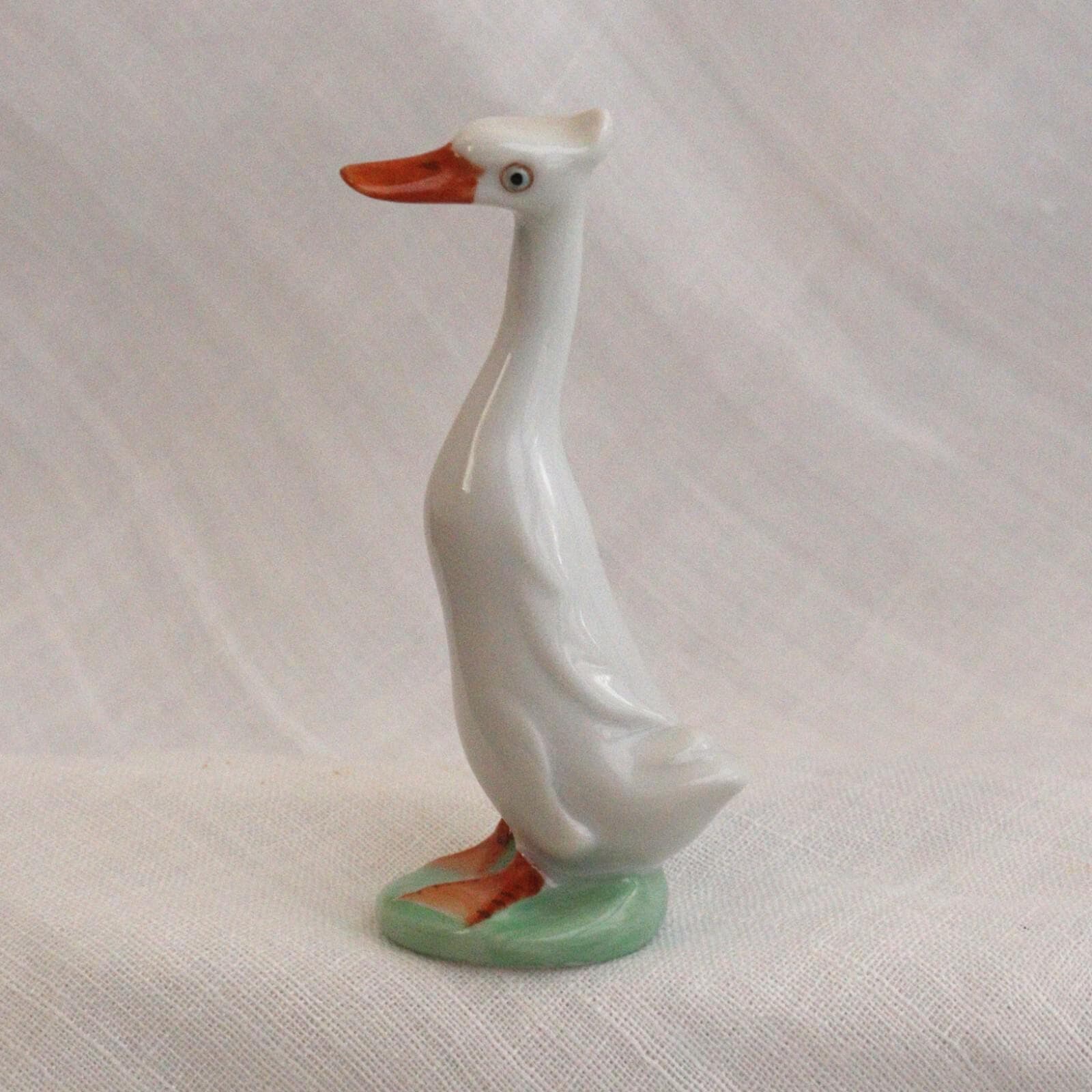 Porcelain Duck Figurine: Cheeky White Runner - Hand-Painted Art Nouveau