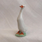 Porcelain Duck Figurine: Cheeky White Runner - Hand-Painted Art Nouveau