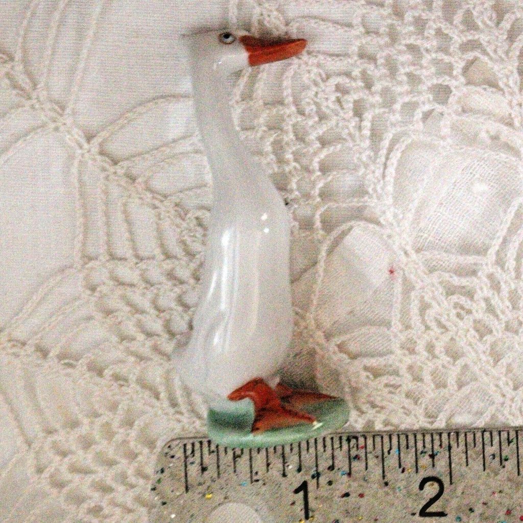 Porcelain Duck Figurine: Cheeky White Runner - Hand-Painted Art Nouveau