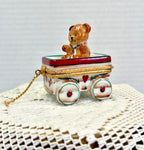 Rochard limoges teddy bear on wagon porcelain trinket box, peint main