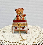 Rochard limoges teddy bear on wagon porcelain trinket box, peint main