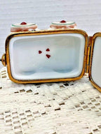 Rochard limoges teddy bear on wagon porcelain trinket box, peint main