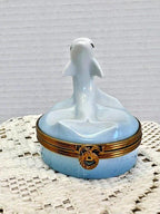 Limoges playful dolphin porcelain trinket box, peint main (retired)