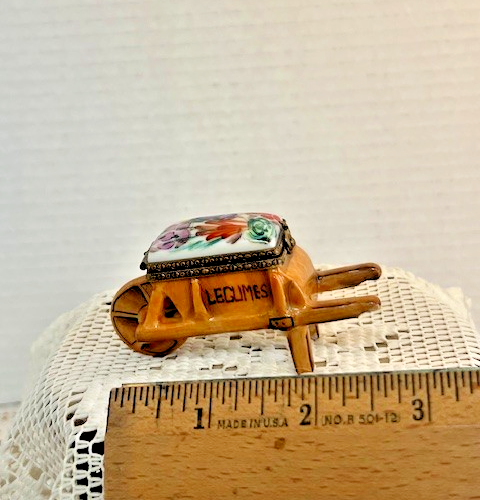 Limoges Trinket Box - Light brown Legumes wheel barrel with snail snap
