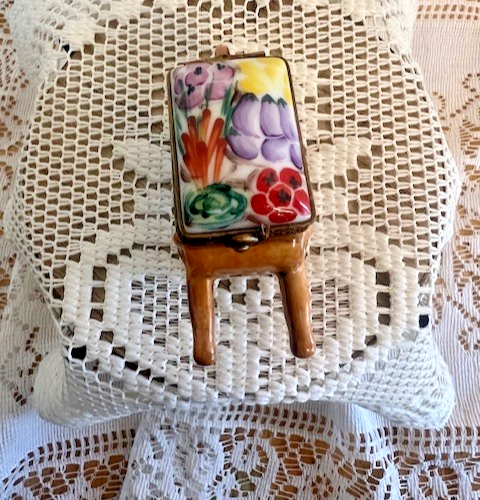 Limoges Trinket Box - Light brown Legumes wheel barrel with snail snap