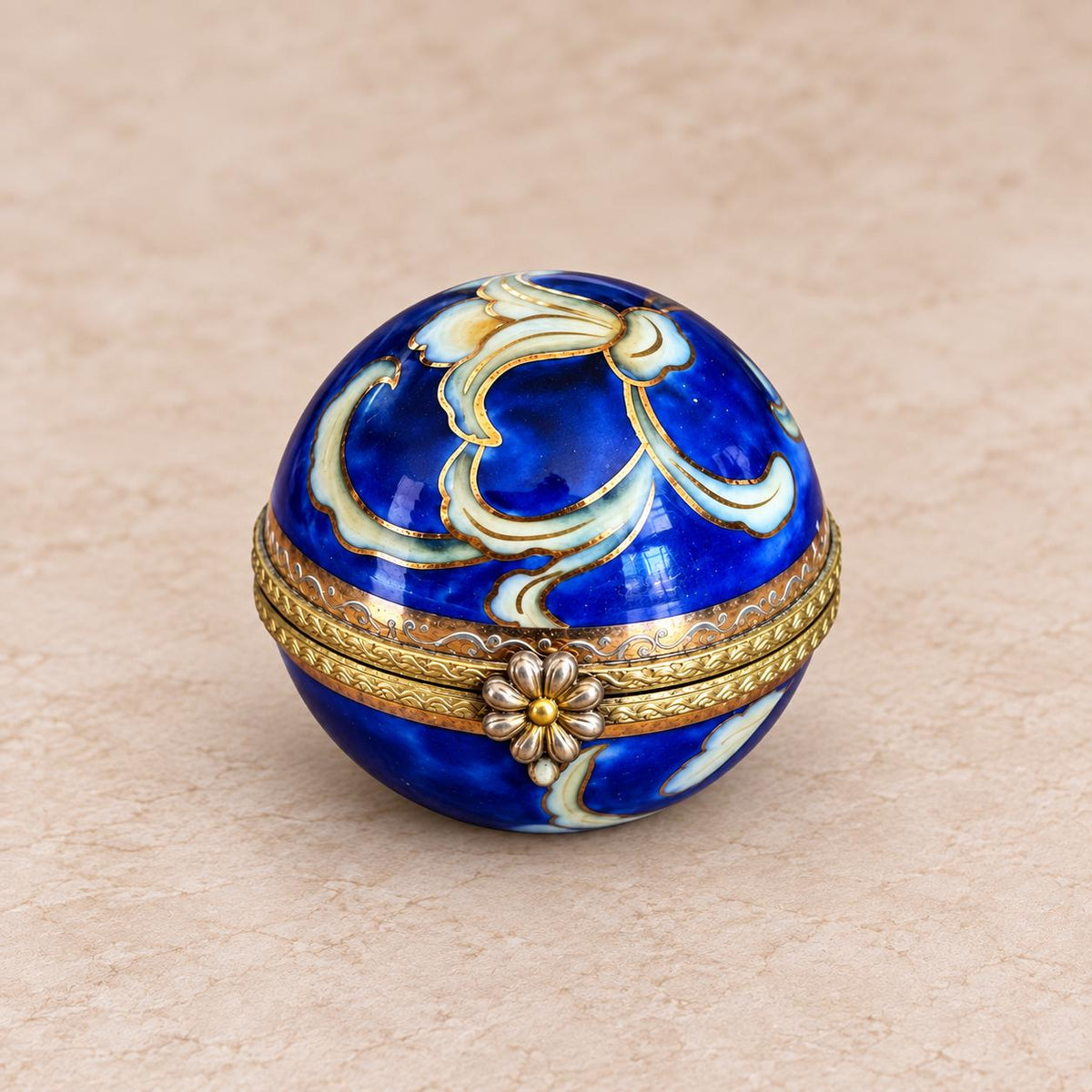 Vintage cobalt blue porcelain trinket box with crowned K mark, floral hinged pill box