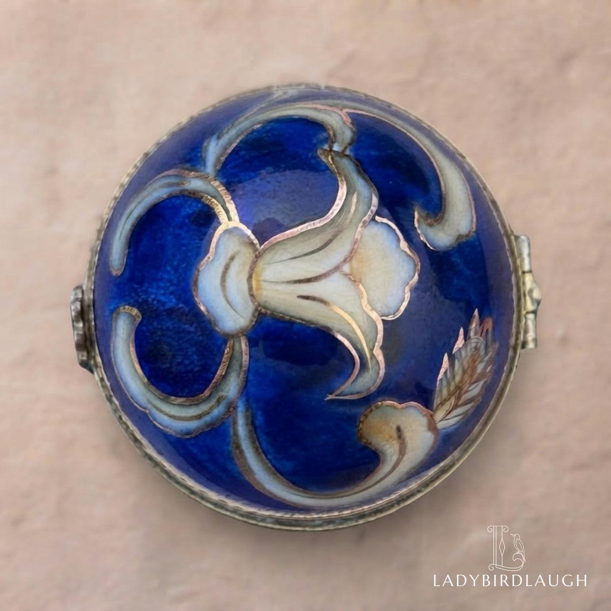 Vintage cobalt blue porcelain trinket box with crowned K mark, floral hinged pill box