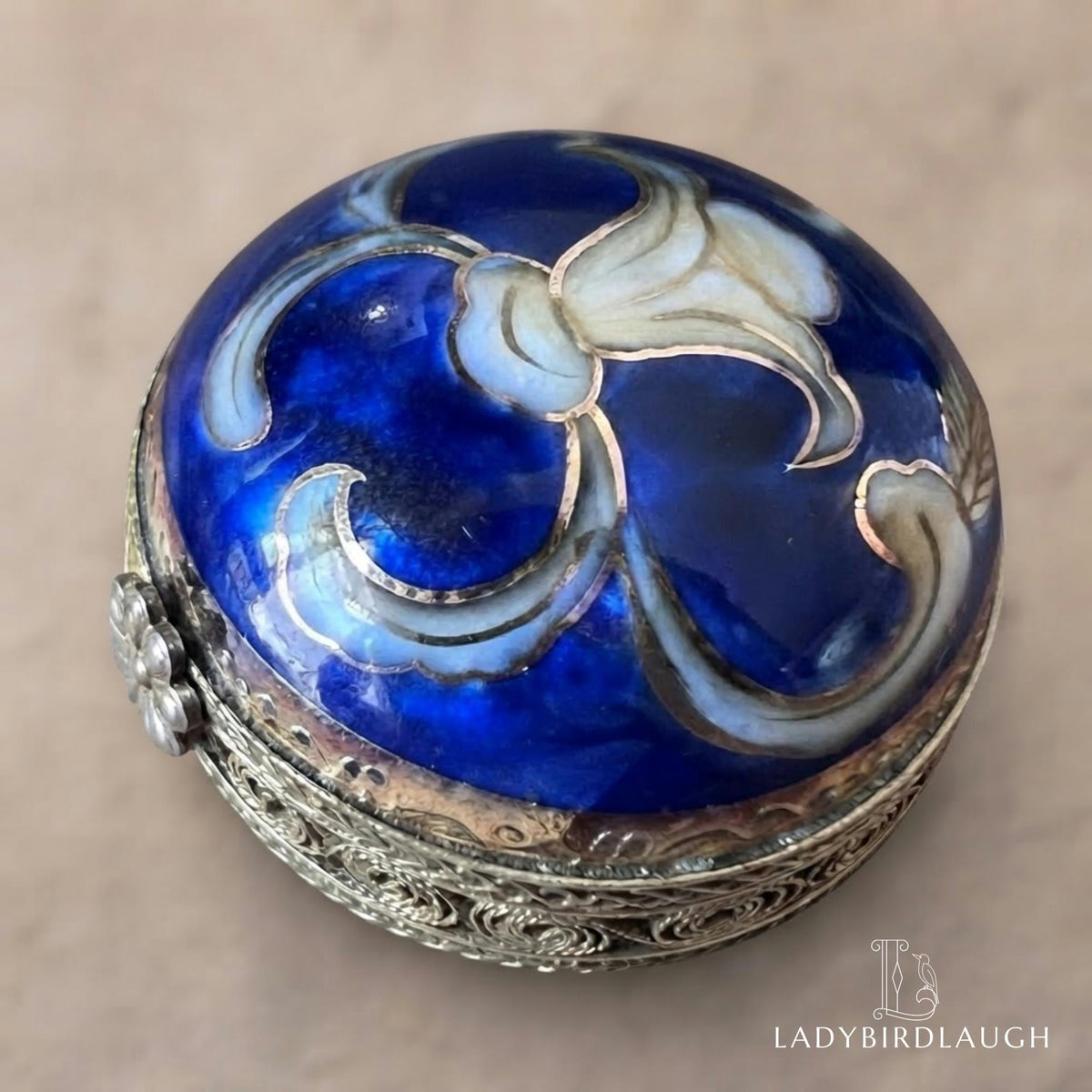 Vintage cobalt blue porcelain trinket box with crowned K mark, floral hinged pill box