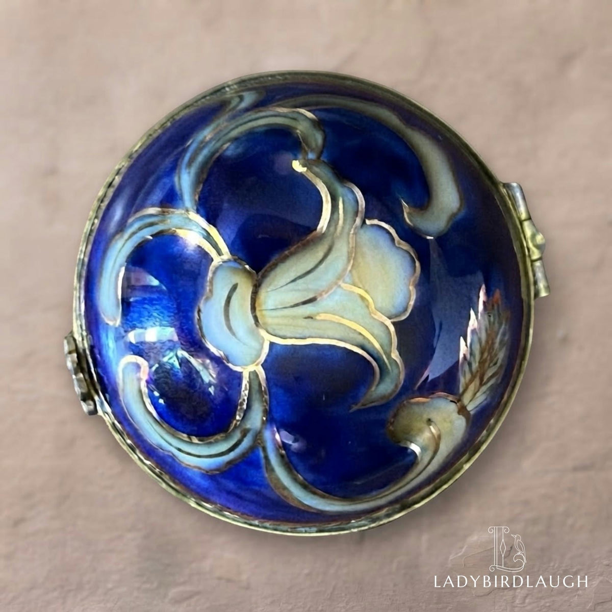 Vintage cobalt blue porcelain trinket box with crowned K mark, floral hinged pill box