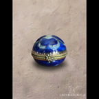Vintage cobalt blue porcelain trinket box with crowned K mark, floral hinged pill box