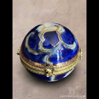 Vintage cobalt blue porcelain trinket box with crowned K mark, floral hinged pill box