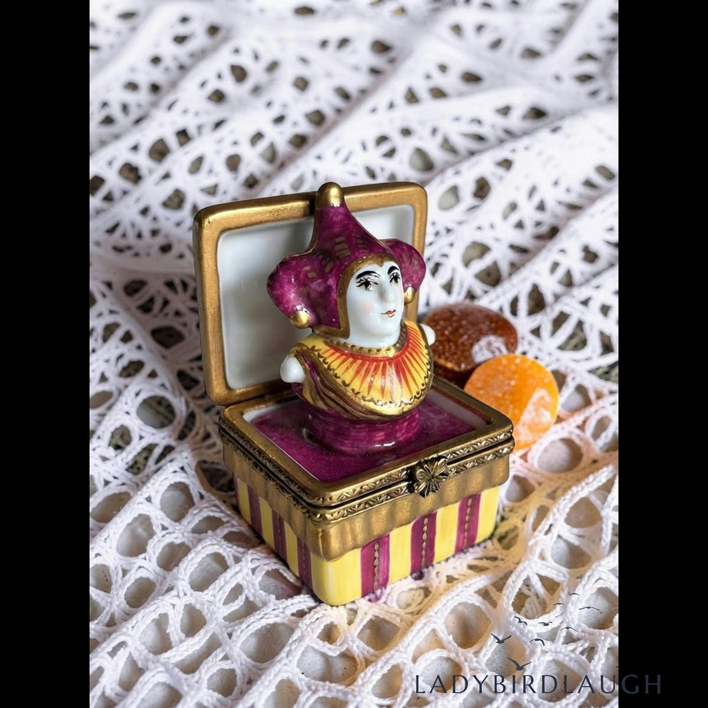 Vintage P.V. Limoges France hand painted jester jack-in-the-box porcelain trinket box