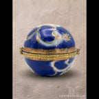 Vintage cobalt blue porcelain trinket box with crowned K mark, floral hinged pill box