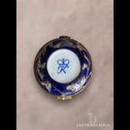 Vintage cobalt blue porcelain trinket box with crowned K mark, floral hinged pill box