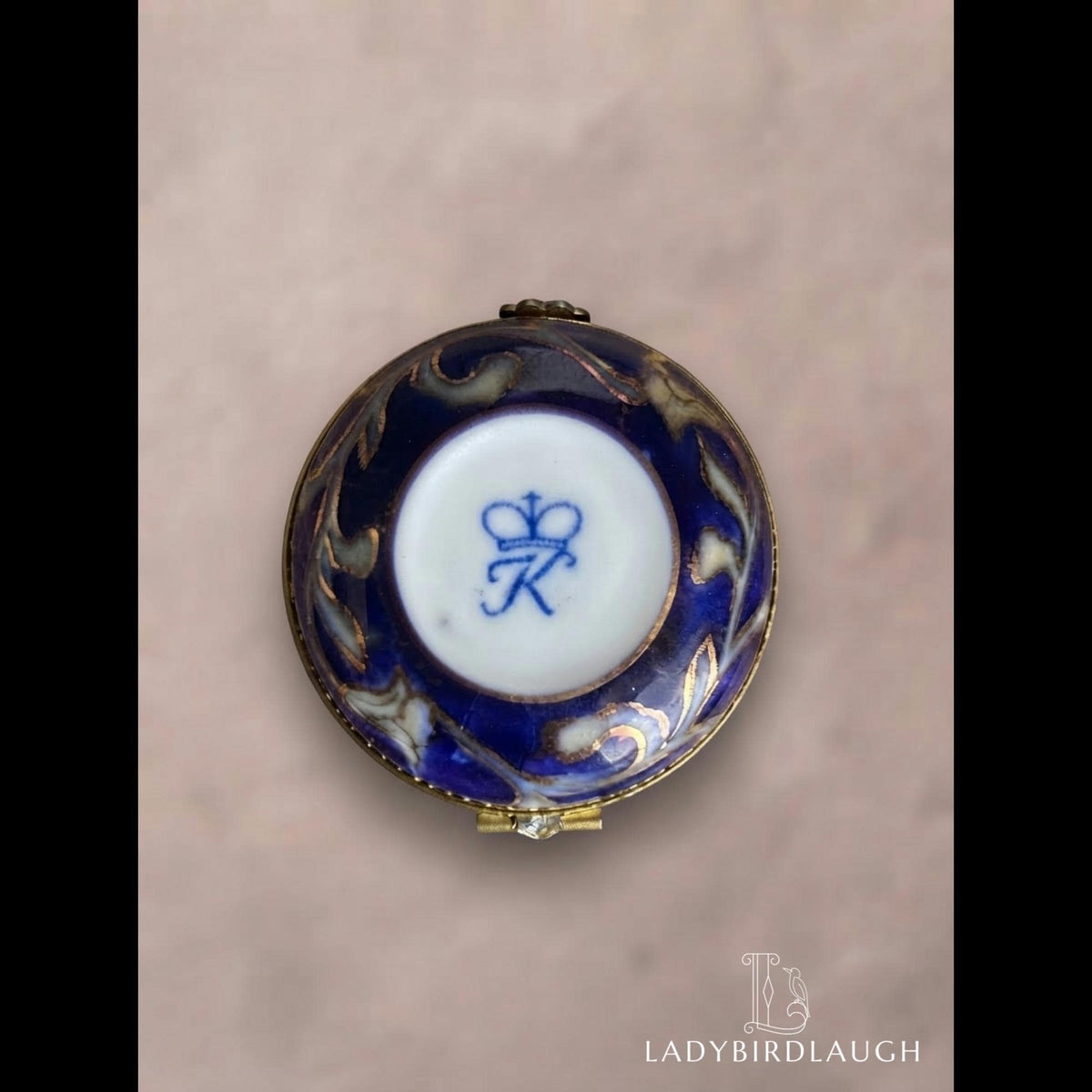 Vintage cobalt blue porcelain trinket box with crowned K mark, floral hinged pill box