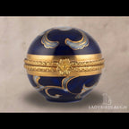 Vintage cobalt blue porcelain trinket box with crowned K mark, floral hinged pill box