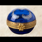 Vintage cobalt blue porcelain trinket box with crowned K mark, floral hinged pill box