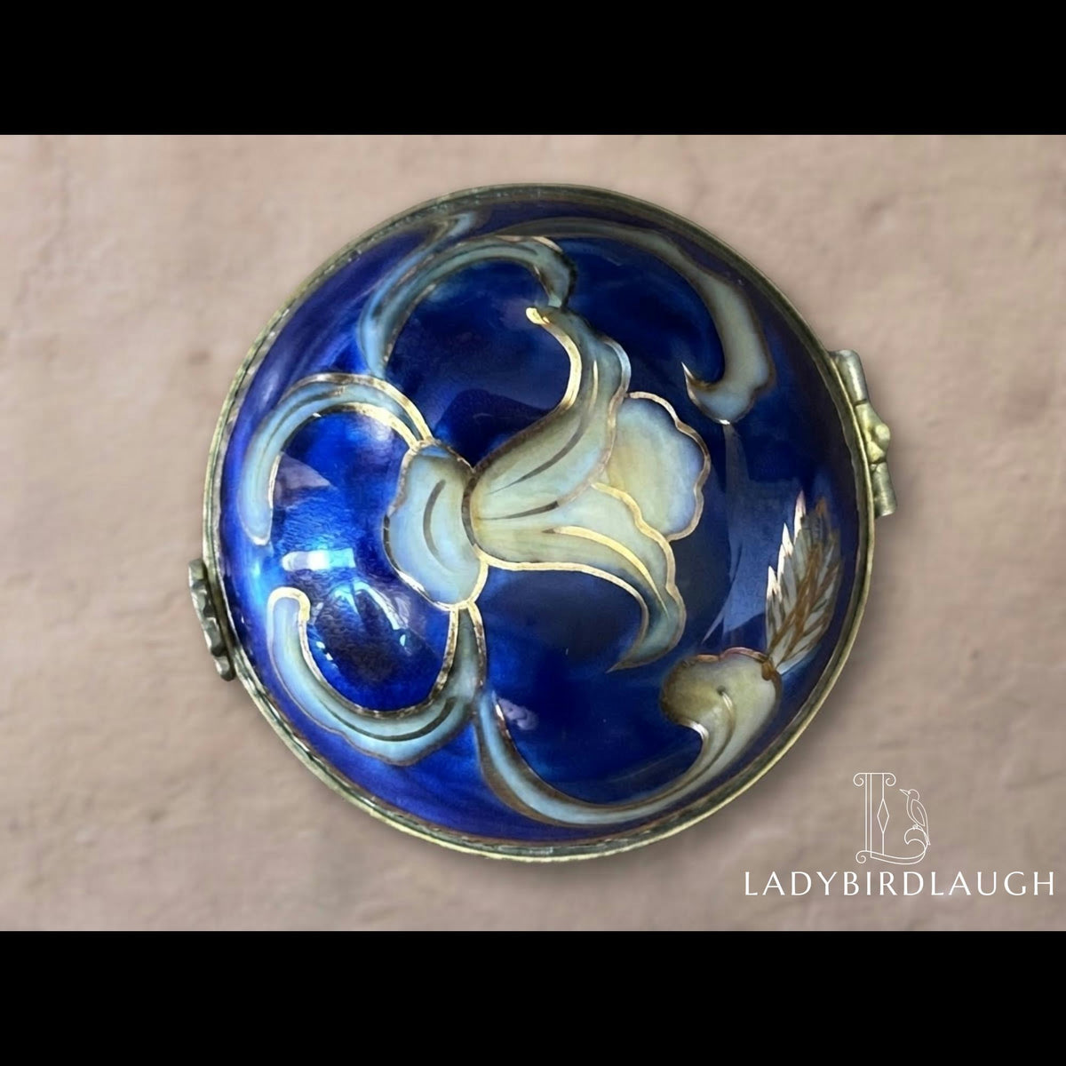 Vintage cobalt blue porcelain trinket box with crowned K mark, floral hinged pill box