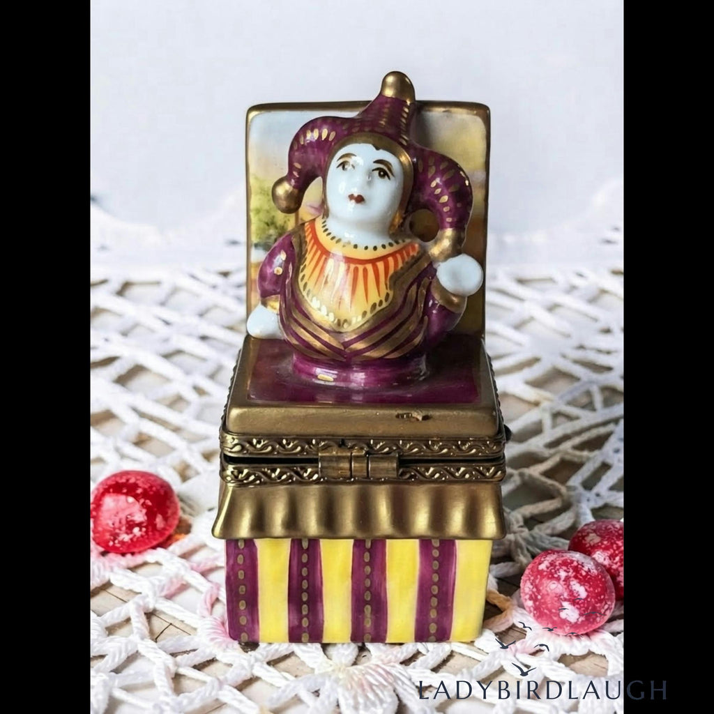 Vintage P.V. Limoges France hand painted jester jack-in-the-box porcelain trinket box