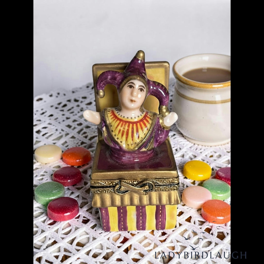 Vintage P.V. Limoges France hand painted jester jack-in-the-box porcelain trinket box