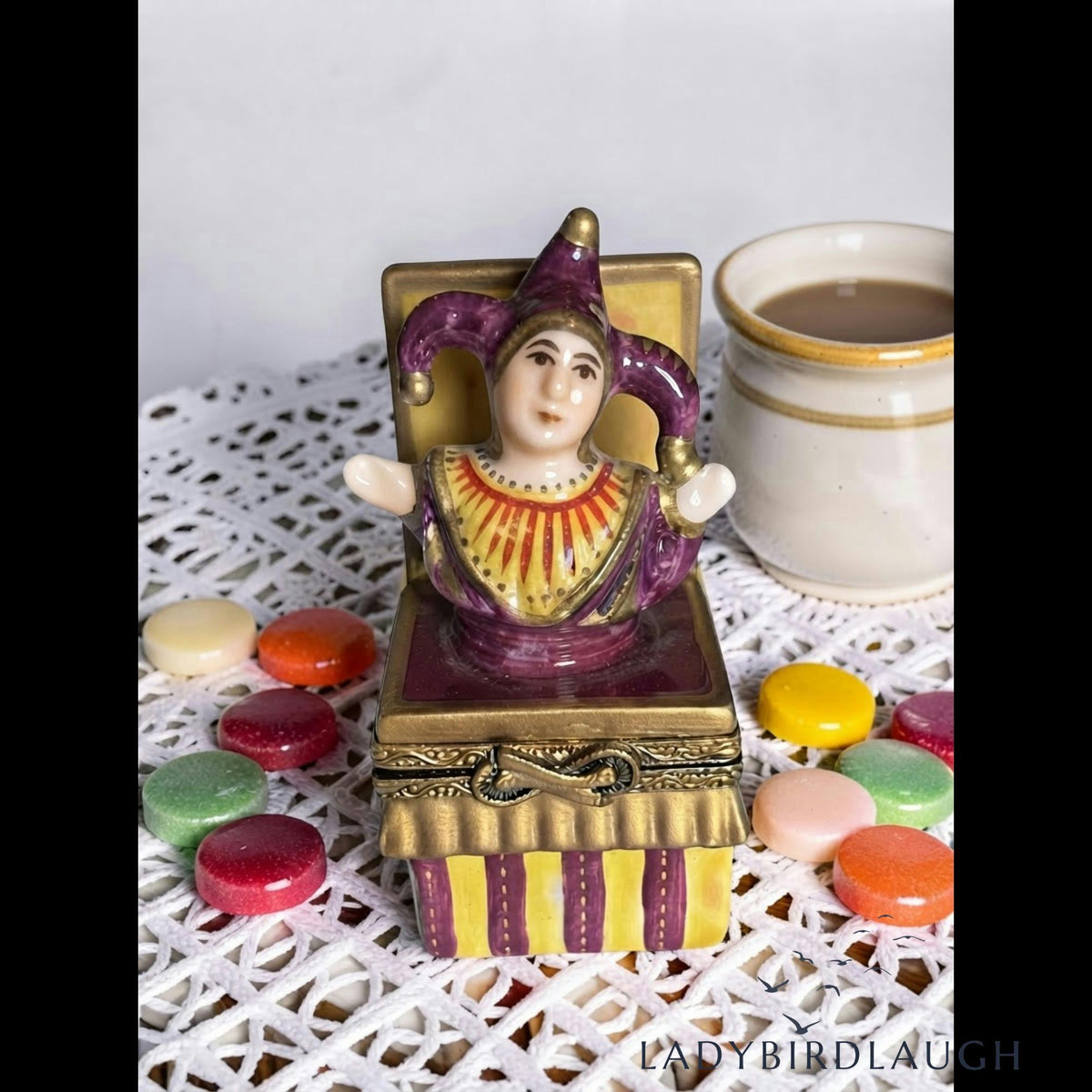 Vintage P.V. Limoges France hand painted jester jack-in-the-box porcelain trinket box