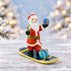 La Gloriette Limoges snowboarding Santa, hand painted French porcelain Christmas collectible