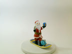 La Gloriette Limoges snowboarding Santa, hand painted French porcelain Christmas collectible