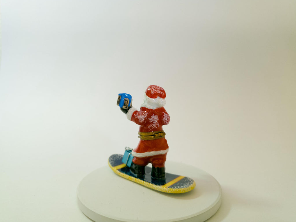 La Gloriette Limoges snowboarding Santa, hand painted French porcelain Christmas collectible