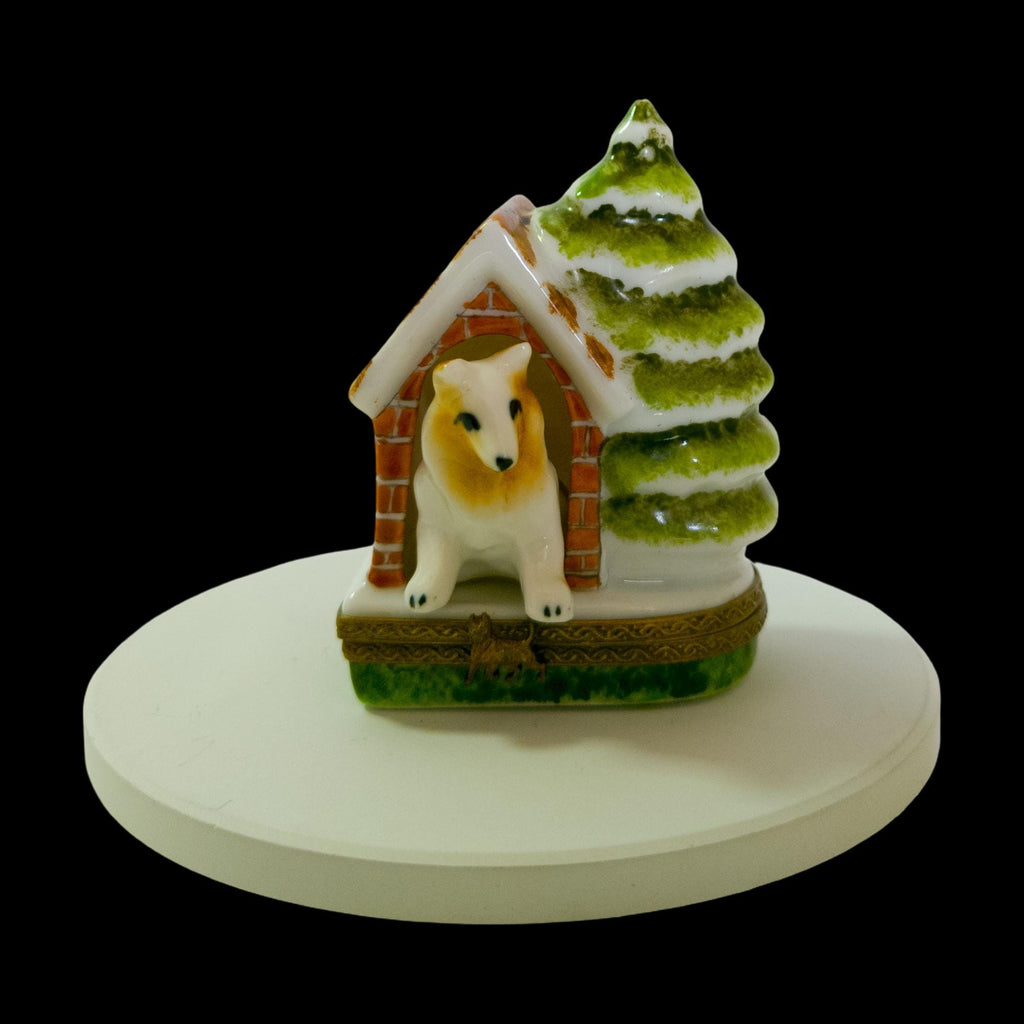 Limoges France doghouse trinket box with dog and snowy Christmas tree, hand-painted porcelain