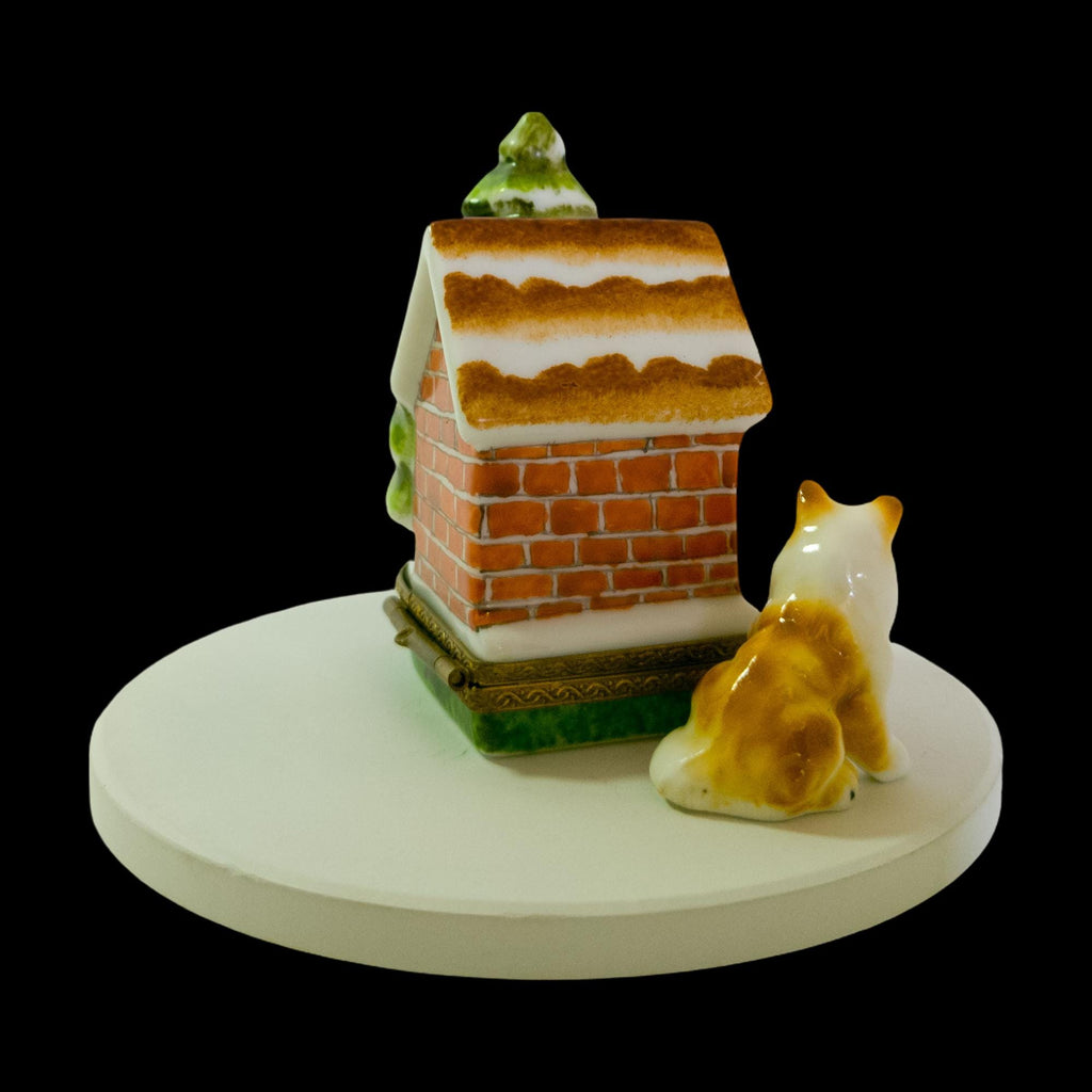 Limoges France doghouse trinket box with dog and snowy Christmas tree, hand-painted porcelain