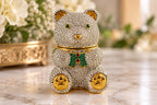 Rhinestone teddy bear trinket box, green jeweled eyes, gold-tone accents
