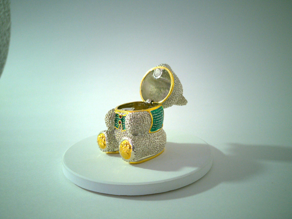 Rhinestone teddy bear trinket box, green jeweled eyes, gold-tone accents