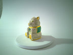 Rhinestone teddy bear trinket box, green jeweled eyes, gold-tone accents