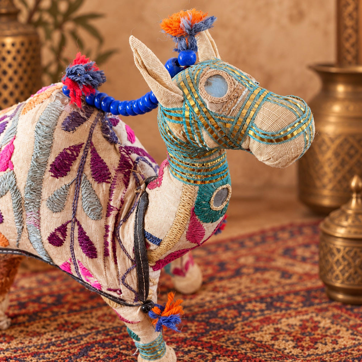 Embroidered Indian fabric camel figurine with blue beads, colorful tassels and bohemian folk art details