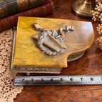 Grand piano music box with amber marbled top, ornate gold-tone detailing and Swiss musical movement
