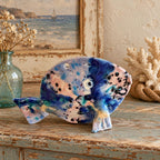 Hand crafted pottery fish sculpture with marbled blue and white glaze