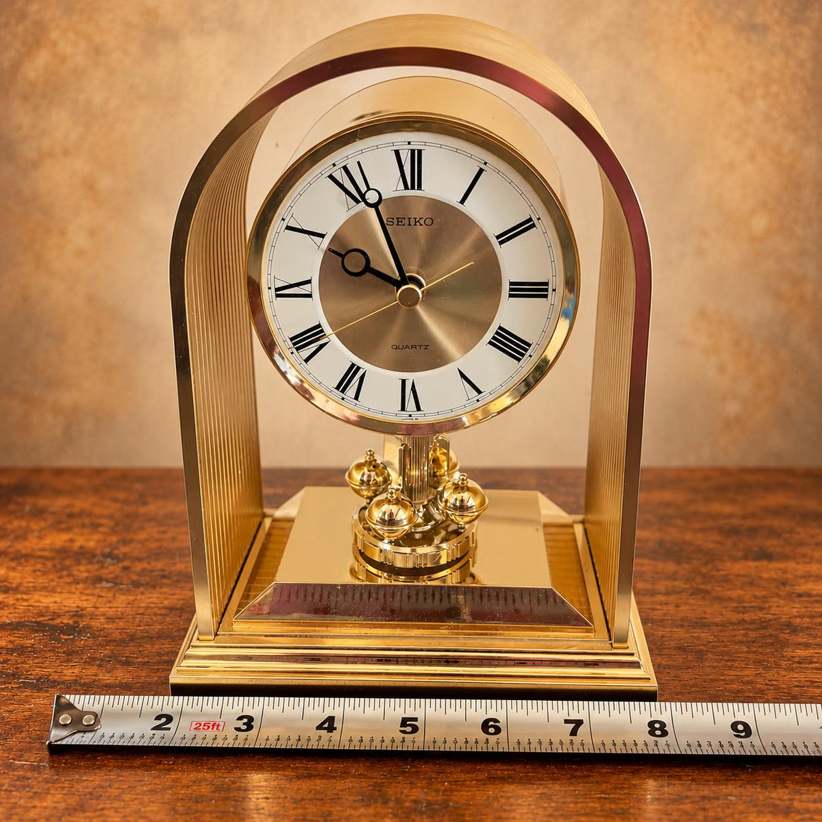 Seiko quartz anniversary mantel clock with gold-tone arch