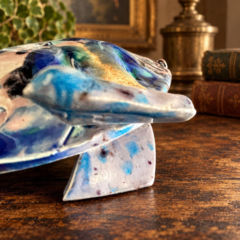 Hand crafted pottery fish sculpture with marbled blue and white glaze